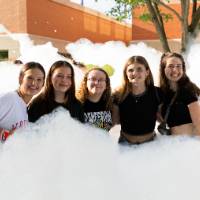 students standing in foam during Laker Kickoff